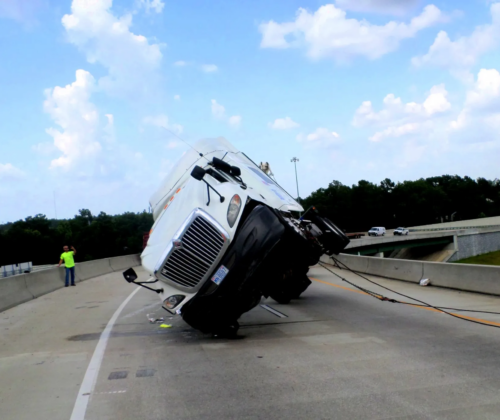Overturned truck collision highway recovery