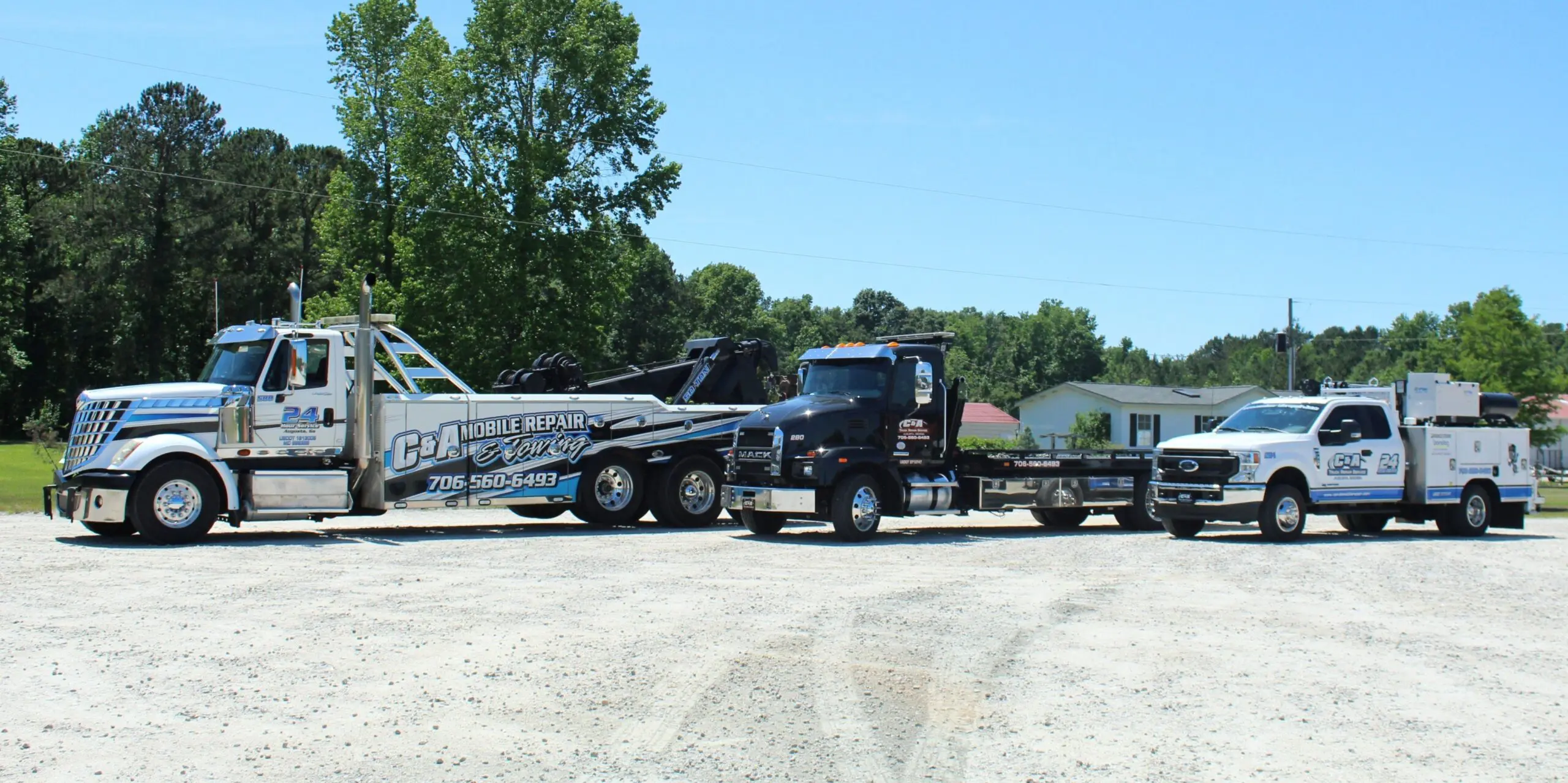 Towing trucks on gravel lot