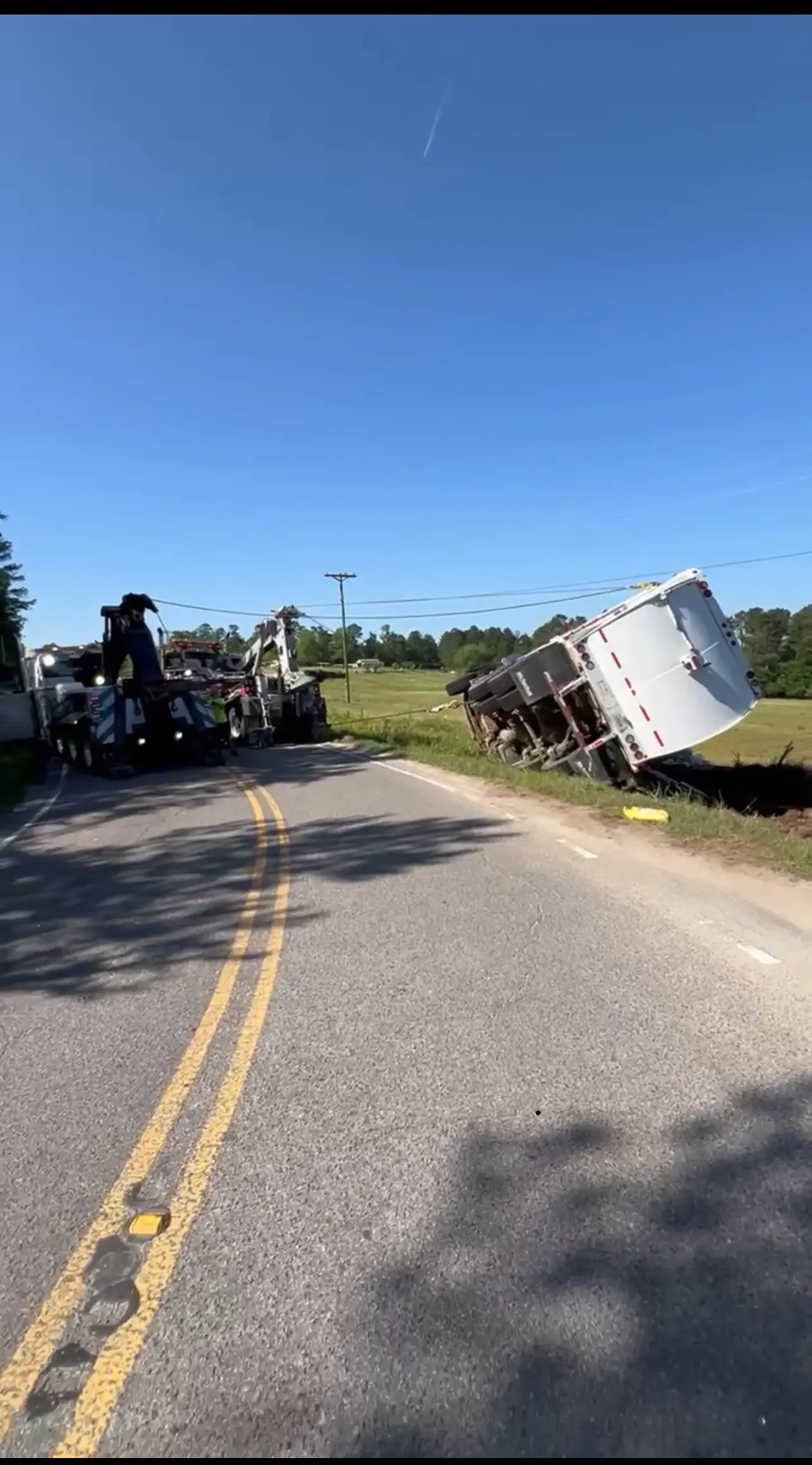 Truck towing roadside recovery service