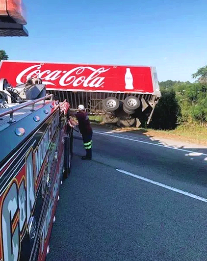 Overturned truck roadside towing service