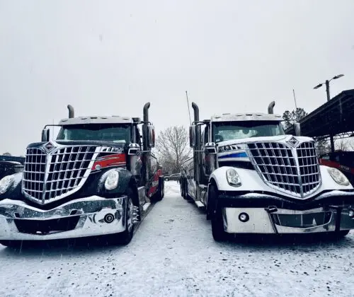 Tow trucks in snow service